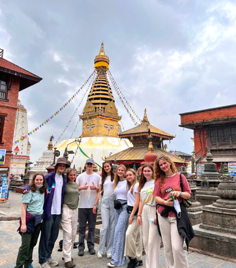A group of GapGuru Gap Year students standing in front of a temple in Kathmandu - GapGuru