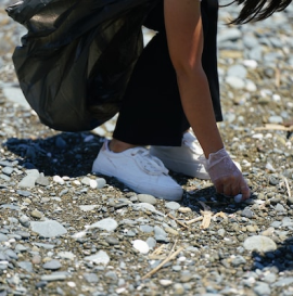 Child picking up stones - GapGuru