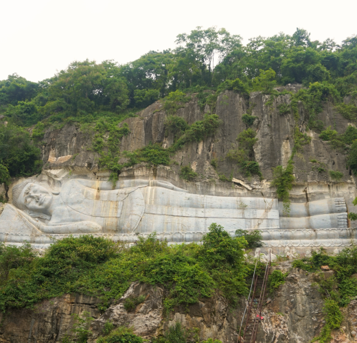 buddha carved into mountaain